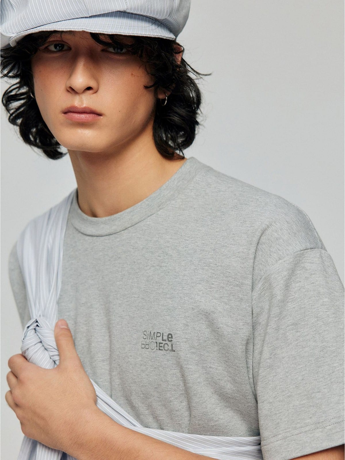 SIMPLE PROJECT Inverted Silver Logo Crewneck T Shirt in Gray - On Male Model