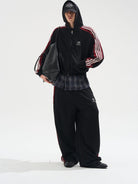 BLINDNOPLAN Contrast Tape Zip Up Hoodie in Black - On Male Model