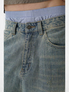MASONPRINCE Frayed Hem Slub Denim Pants in Light Blue - On Model
