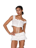 SweetChilling Tie Front Ruffled Mini Skirt in White - On Female Model