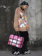 CFIERCE Spiked Cat Print Cage Bag in Red - On Female Model