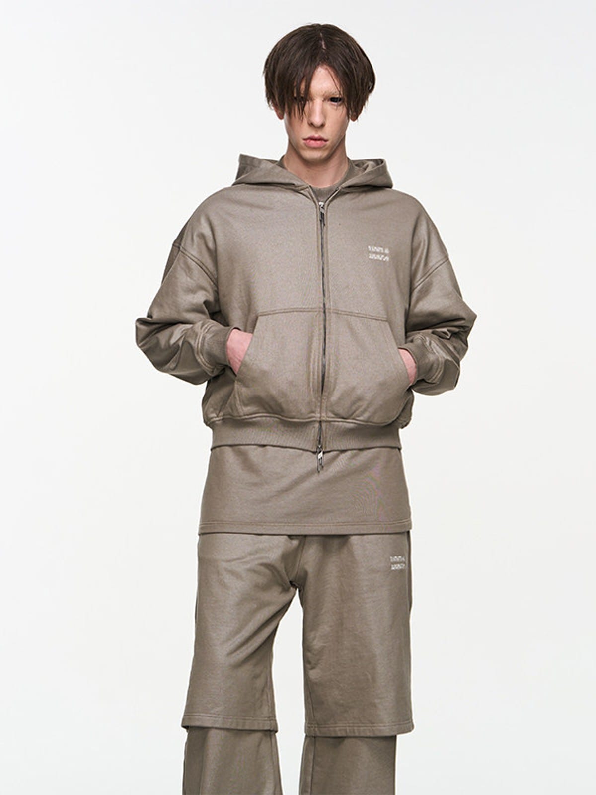 BLINDNOPLAN Metallic Logo Zip Hoodie Pants Set in Beige - On Male Model