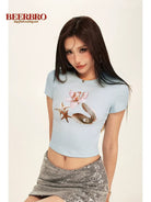 BeerBro Realistic Shell Print Baby Tee in Sky Blue - On Female Model