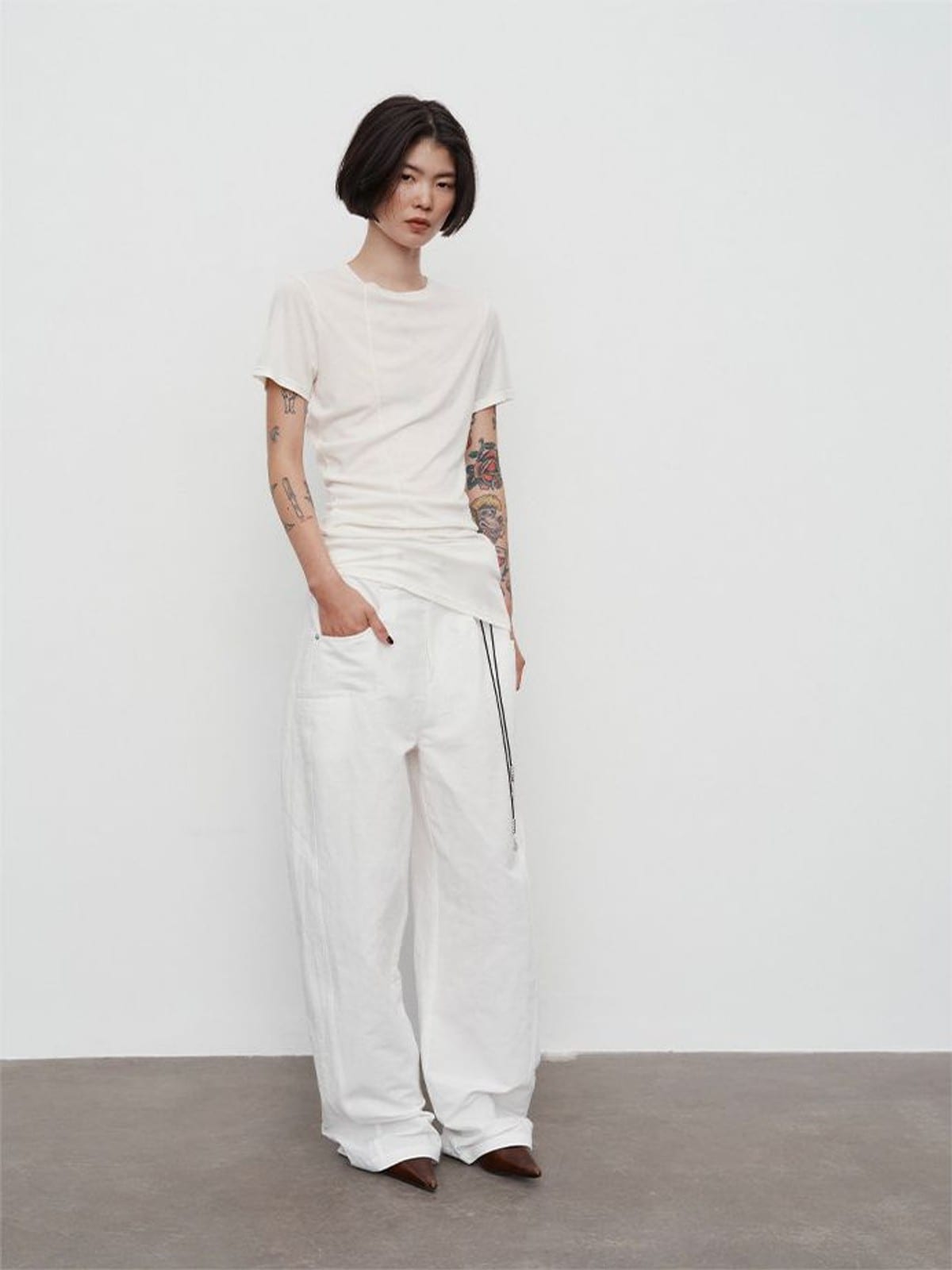 Random Piece Asymmetrical Pleated Silk Blend T Shirt in White - On Female Model