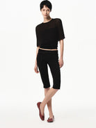 RARELY ALIKE Viscose Blend Belted Cropped Pants in Black - On Female Model