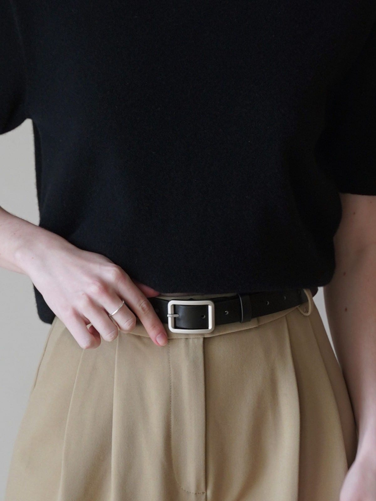 PANLULUPAN Matte Silver Buckle Cowhide Belt in Black - On Female Model