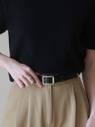 PANLULUPAN Matte Silver Buckle Cowhide Belt in Black - On Female Model