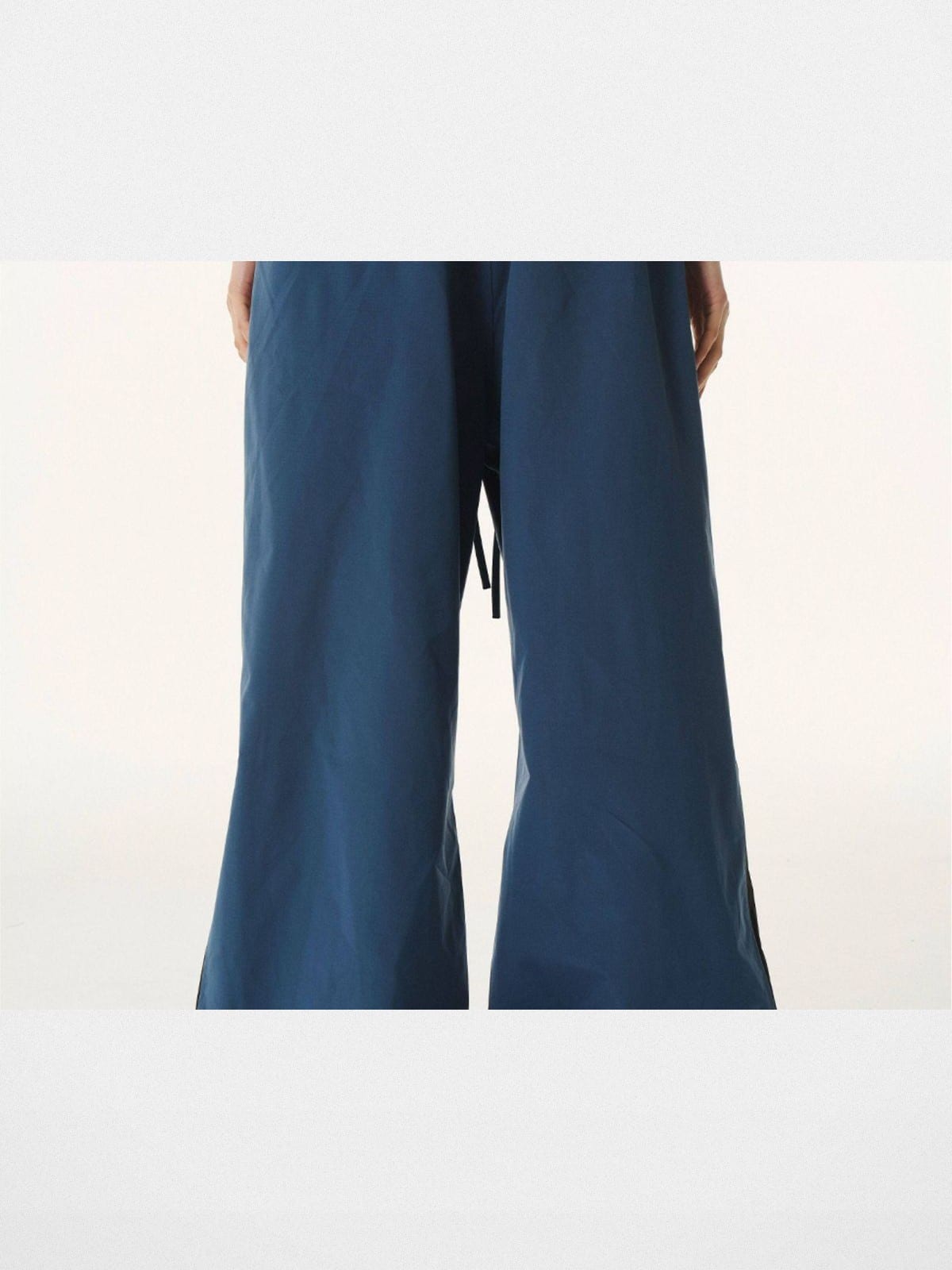 BLINDNOPLAN Contrast Panel Pleated Parachute Pants in Blue - On Model