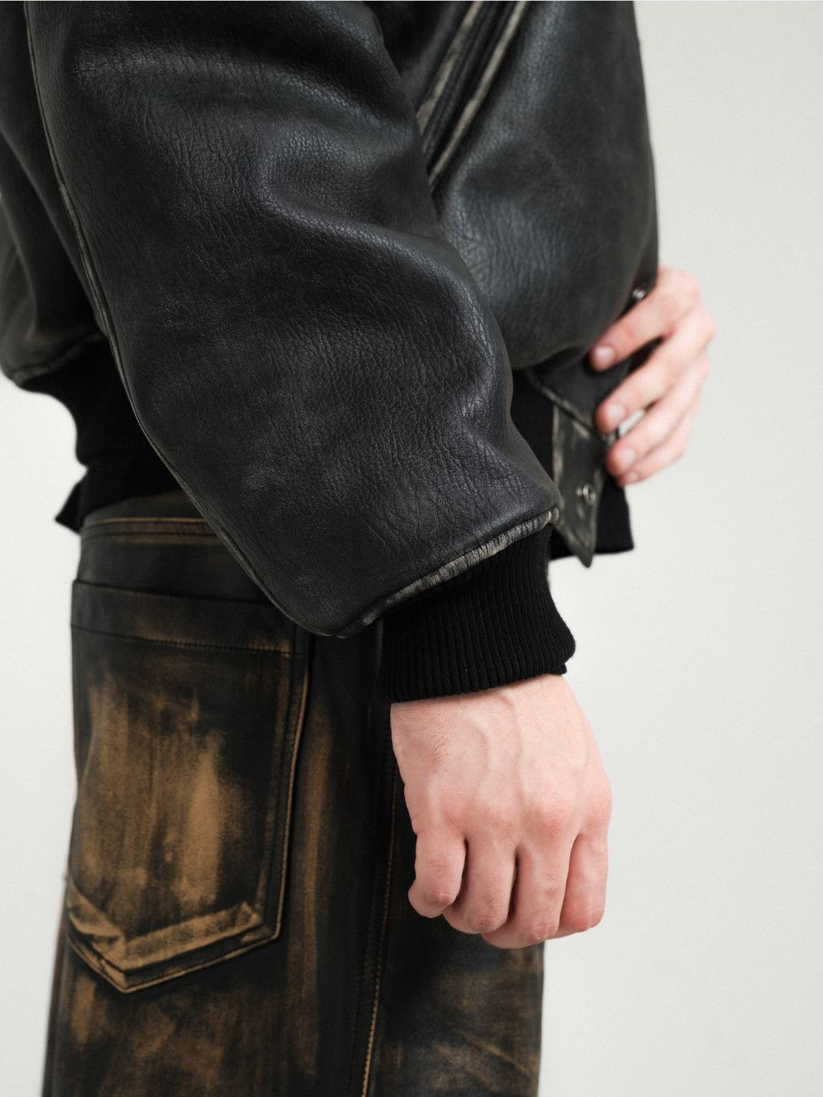 Retro 21 Distressed Faux Leather Padded Jacket in Black - On Model