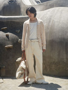 Retro 21 Wide Wale Cotton Corduroy Pants in White - On Male Model