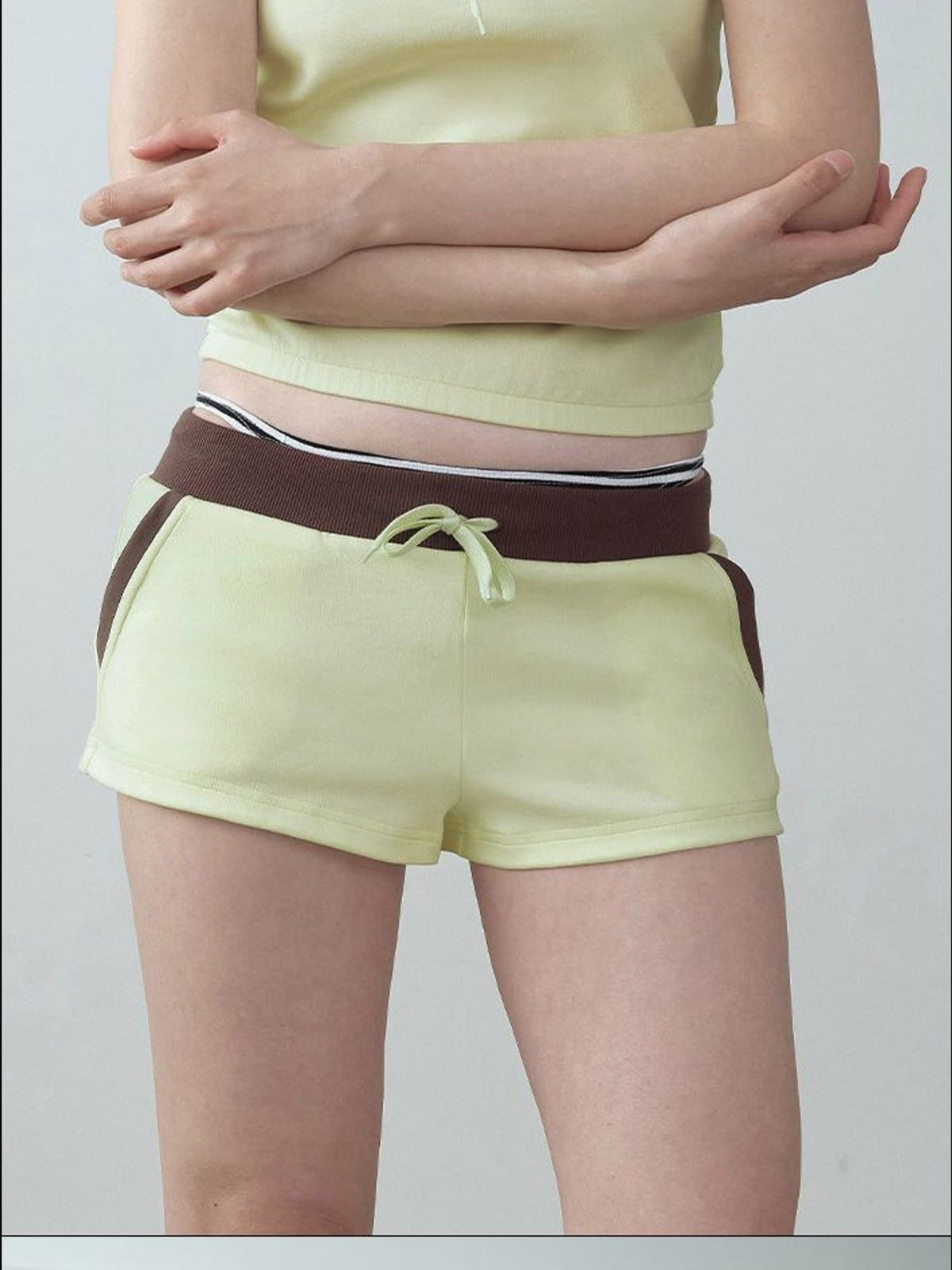 RARELY ALIKE Color Block Cotton Blend Sweatshorts in Yellow - On Female Model