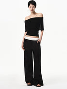 RARELY ALIKE Lyocell Cashmere Off The Shoulder Top in Black - On Female Model