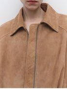 MSBEAST Cropped Leather Drawstring Jacket in Beige - On Female Model