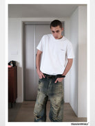 UNKNOWNWORLD Small Logo Cotton T Shirt in White - On Male Model