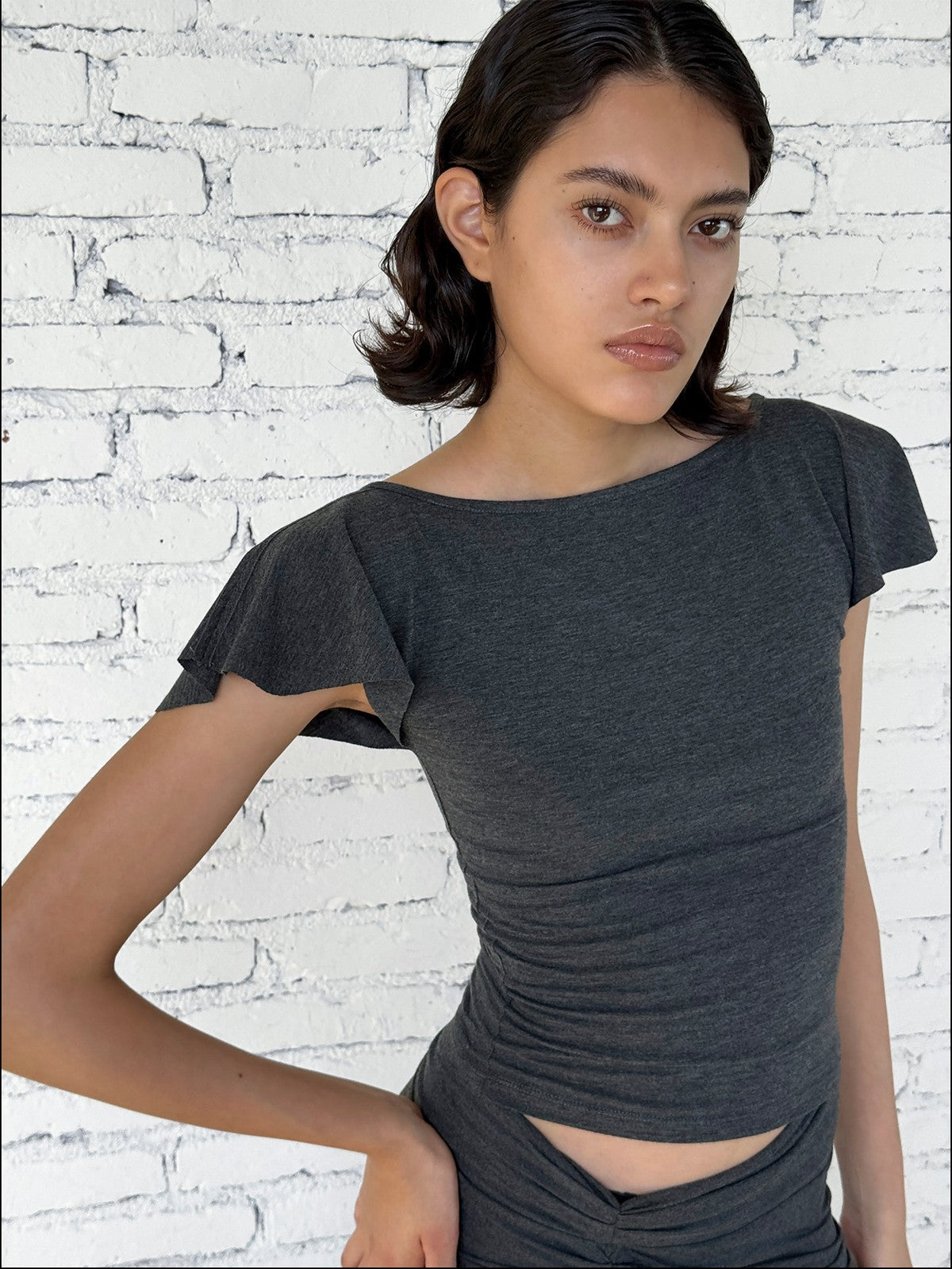 FaxCopyExpress Flutter Sleeve Open Back Top in Gray - On Female Model