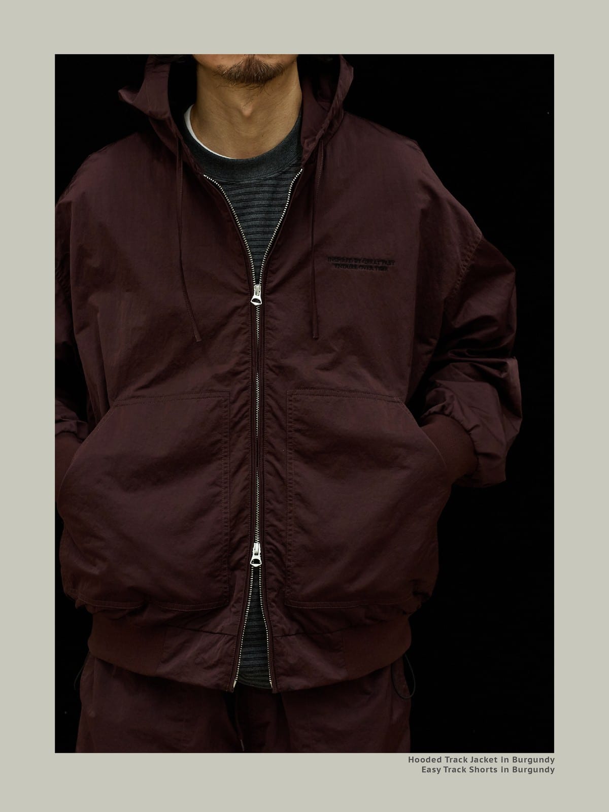 USAGE Crinkle Nylon Hooded Track Jacket in Brown - On Male Model