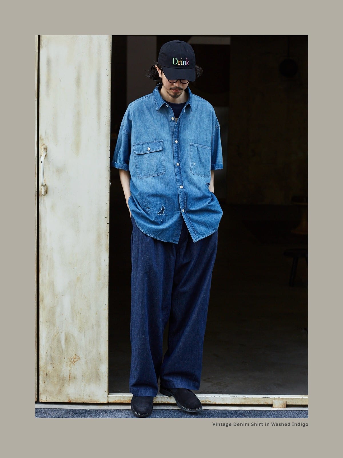 USAGE Distressed Short Sleeve Denim Shirt in Denim - On Male Model