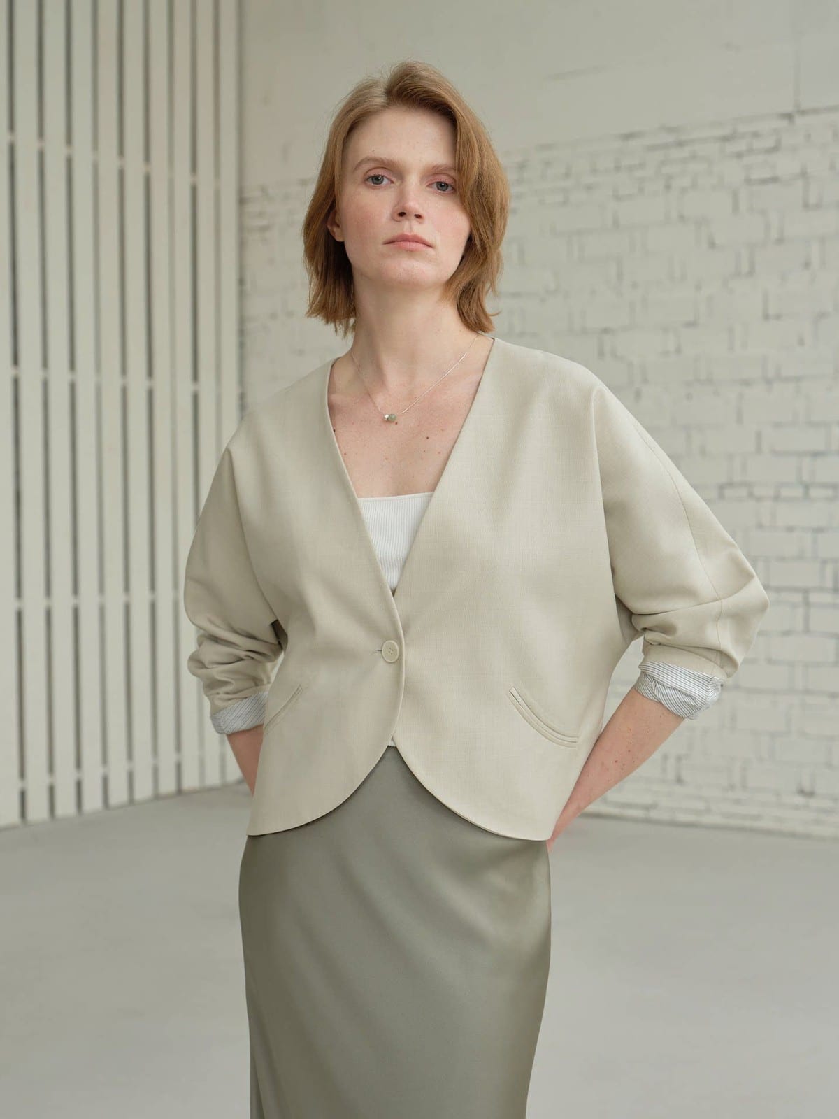 TEASEL Scalloped Edge Wool Blend Cropped Blazer in Green - On Female Model