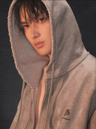 MASONPRINCE Distressed Painted Zip Up Hoodie in Gray - On Male Model