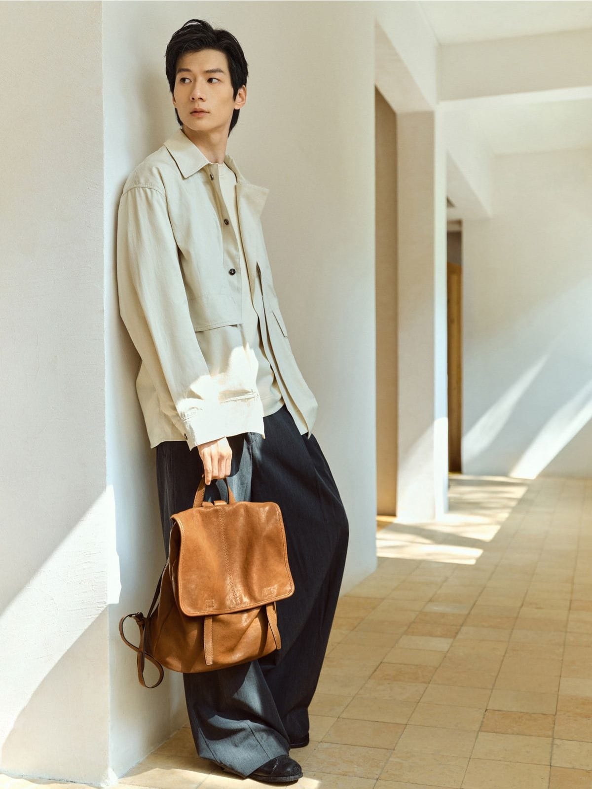 QIUZHEN Vegetable Tanned Goat Leather Backpack in Beige - On Male Model