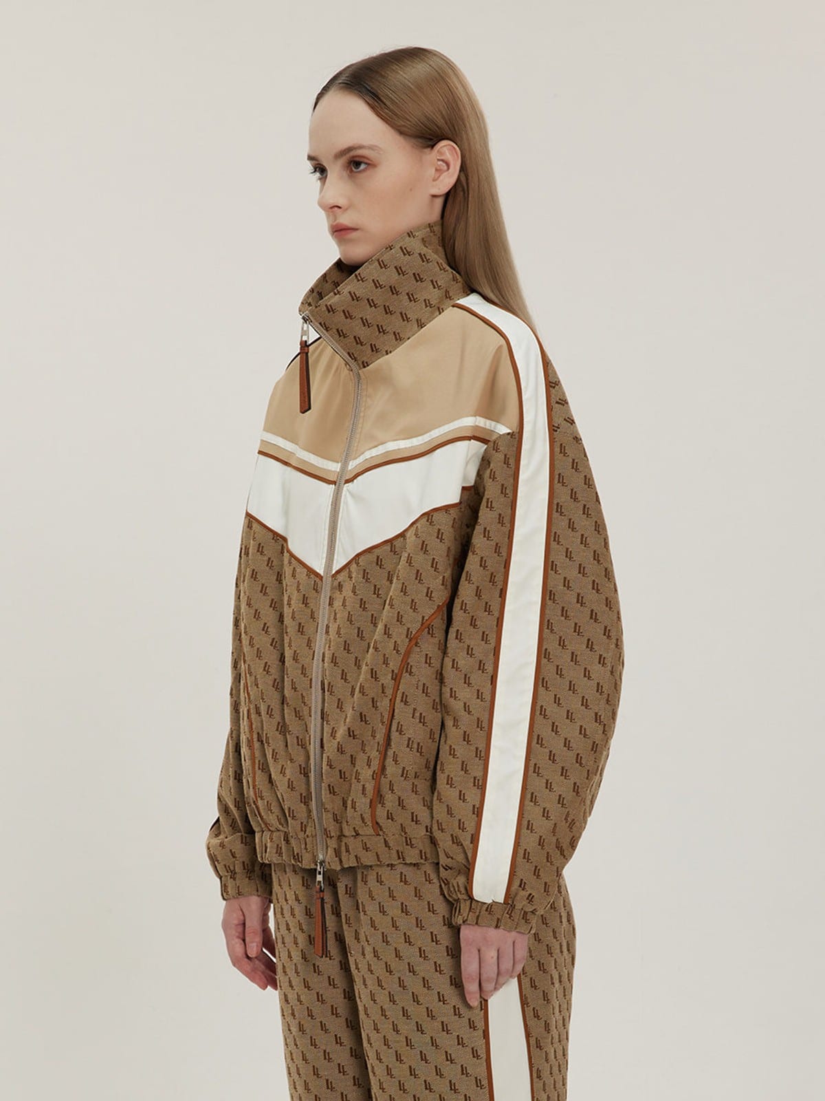 LOSTCTRL Vintage Monogram Track Jacket in Beige - On Female Model