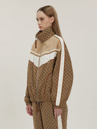 LOSTCTRL Vintage Monogram Track Jacket in Beige - On Female Model