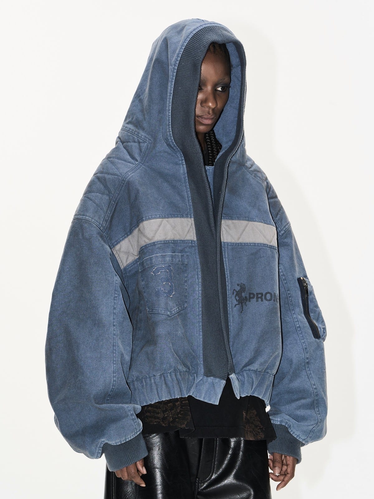 BLINDNOPLAN Distressed Hooded MA 1 Bomber Jacket in Blue - On Female Model
