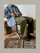 USAGE Hand Distressed Patched Chinos in Olive - On Male Model