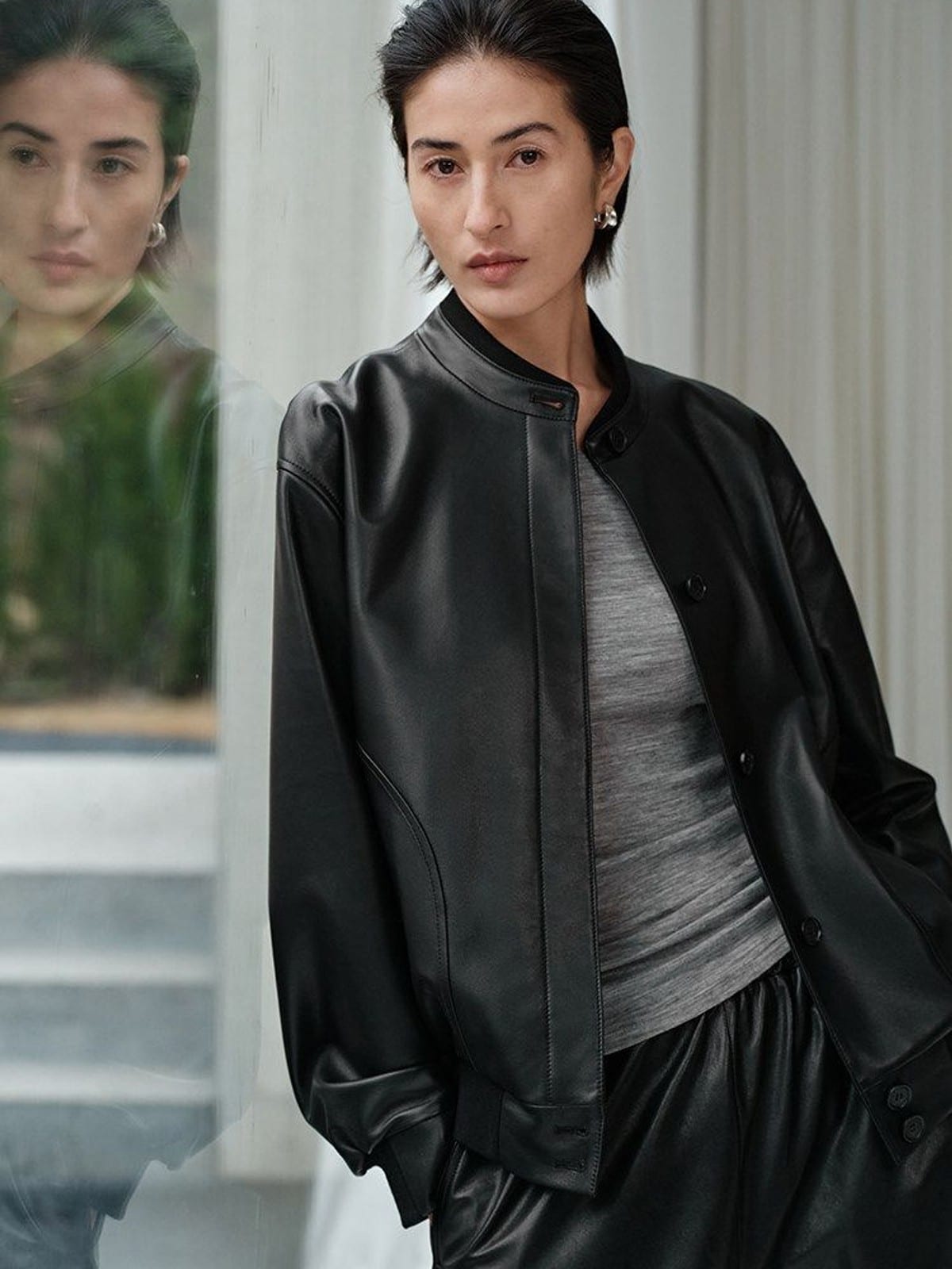MSBEAST Sheepskin Leather Bomber Jacket in Black - On Female Model