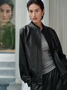MSBEAST Sheepskin Leather Bomber Jacket in Black - On Female Model