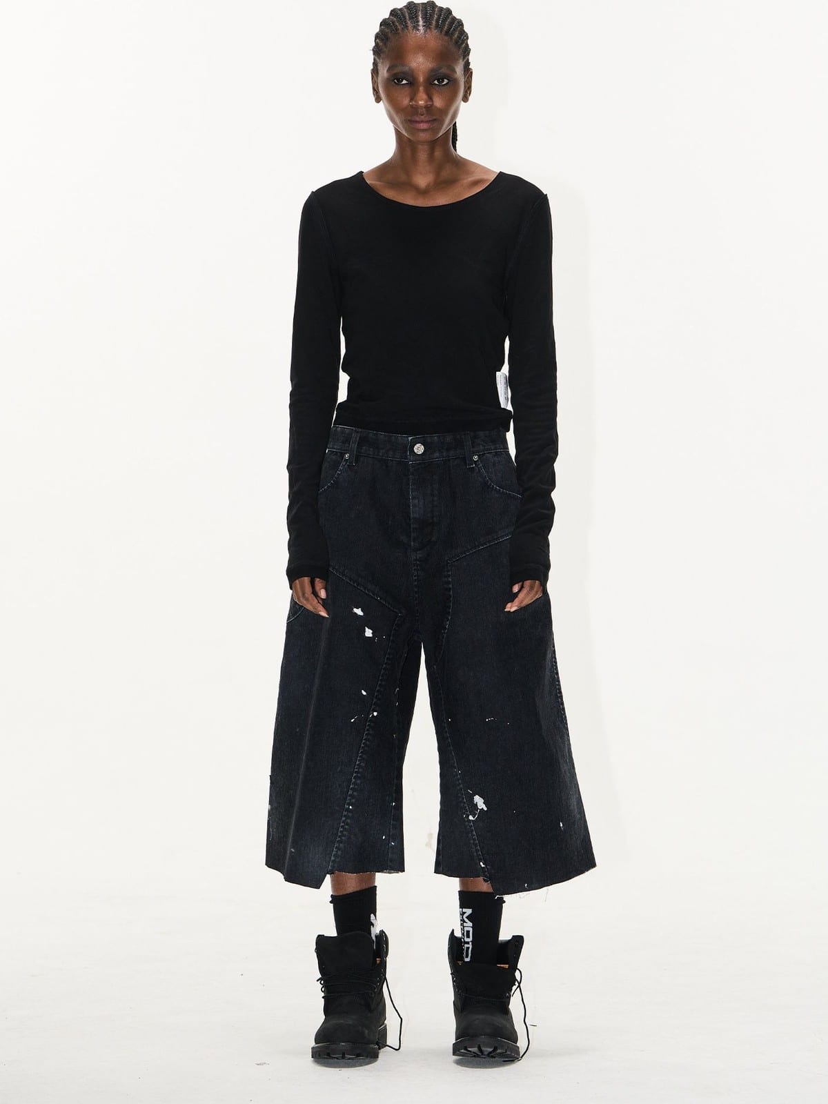 BLINDNOPLAN Ink Splatter Denim Carpenter Shorts in Black - On Female Model