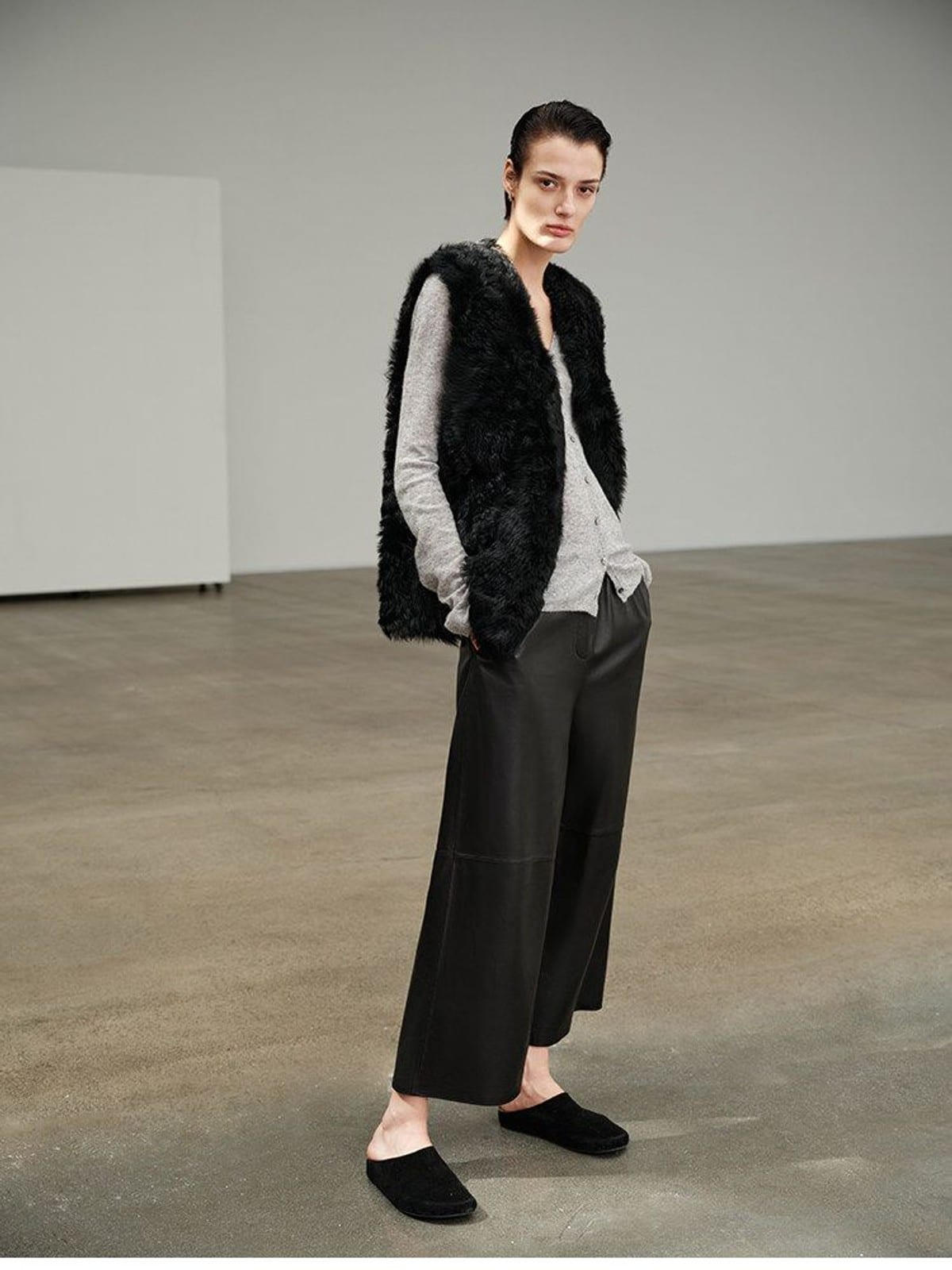 MSBEAST Cropped Wide Leg Leather Trousers in Black - On Female Model