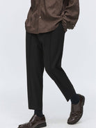 SIMPLE PROJECT Center Seam Cropped Trousers in Black - On Model