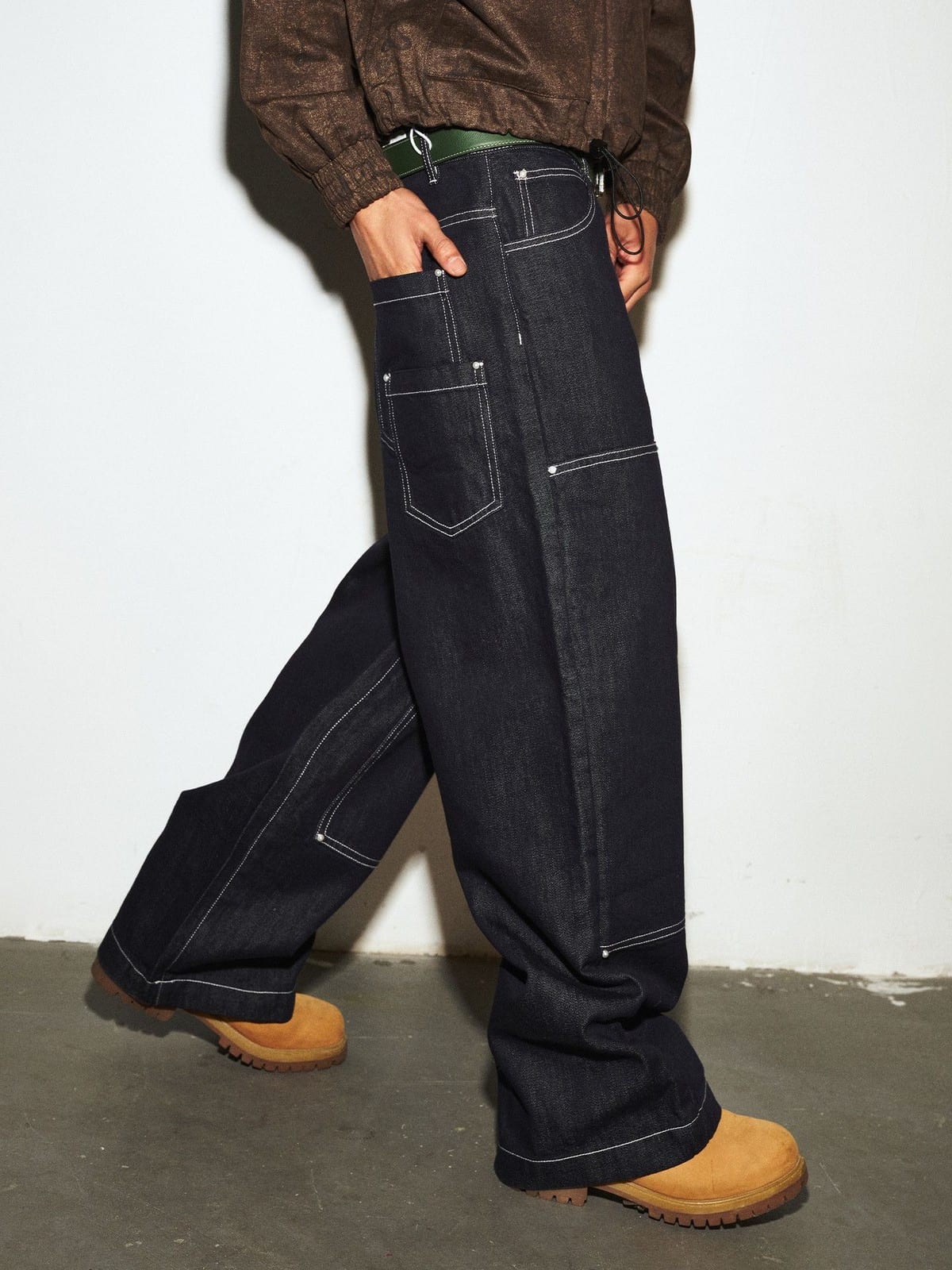 MEDM Contrast Stitch Denim Cargo Jeans in Navy Blue - On Model
