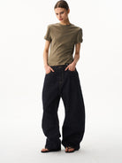 BLINDNOPLAN Curved Wide Leg Raw Denim Jeans in Denim - On Female Model
