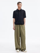 MEDM Lightweight Wide Leg Track Pants in Olive - On Male Model