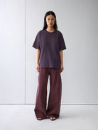 Random Piece Distressed Cotton Blend T Shirt in Purple - On Female Model