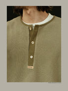 USAGE Heavyweight Waffle Knit Henley Sweatshirt in Olive - On Male Model