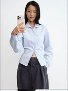 RARELY ALIKE Scalloped Peter Pan Collar Blouse in Sky Blue - On Female Model
