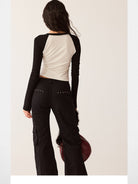BeerBro Riveted Cargo Flare Pants in Black - On Female Model