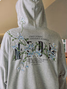 MEDM Floral Embroidered Zip Up Hoodie in Gray - On Model