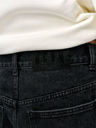 MEDM Washed Wide Leg Jeans in Black - On Model