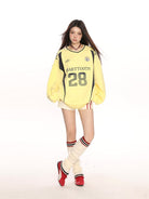 Big Gold studio V Neck Graphic Jersey Sweatshirt in Yellow - On Female Model