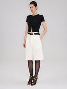 RARELY ALIKE Tailored Bermuda Shorts in White - On Female Model