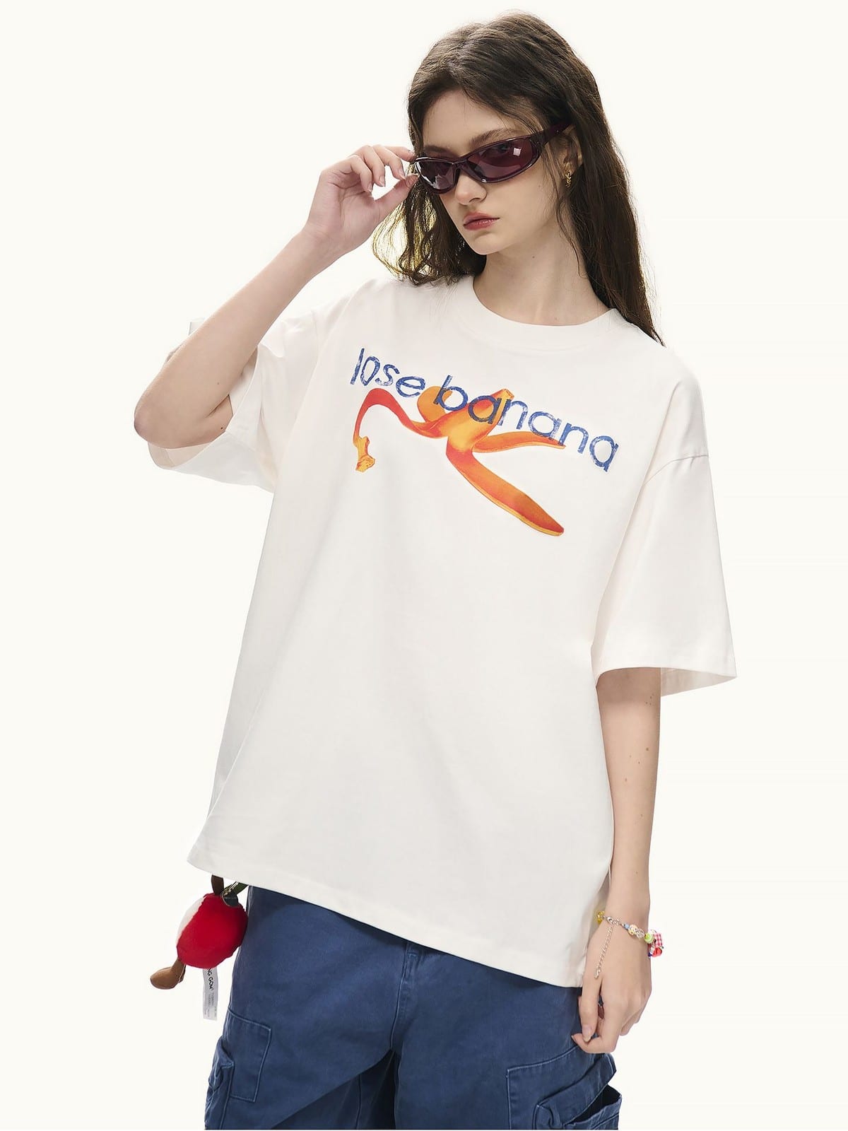 LOSTCTRL Distressed Banana Print Sorona T Shirt in White - On Female Model