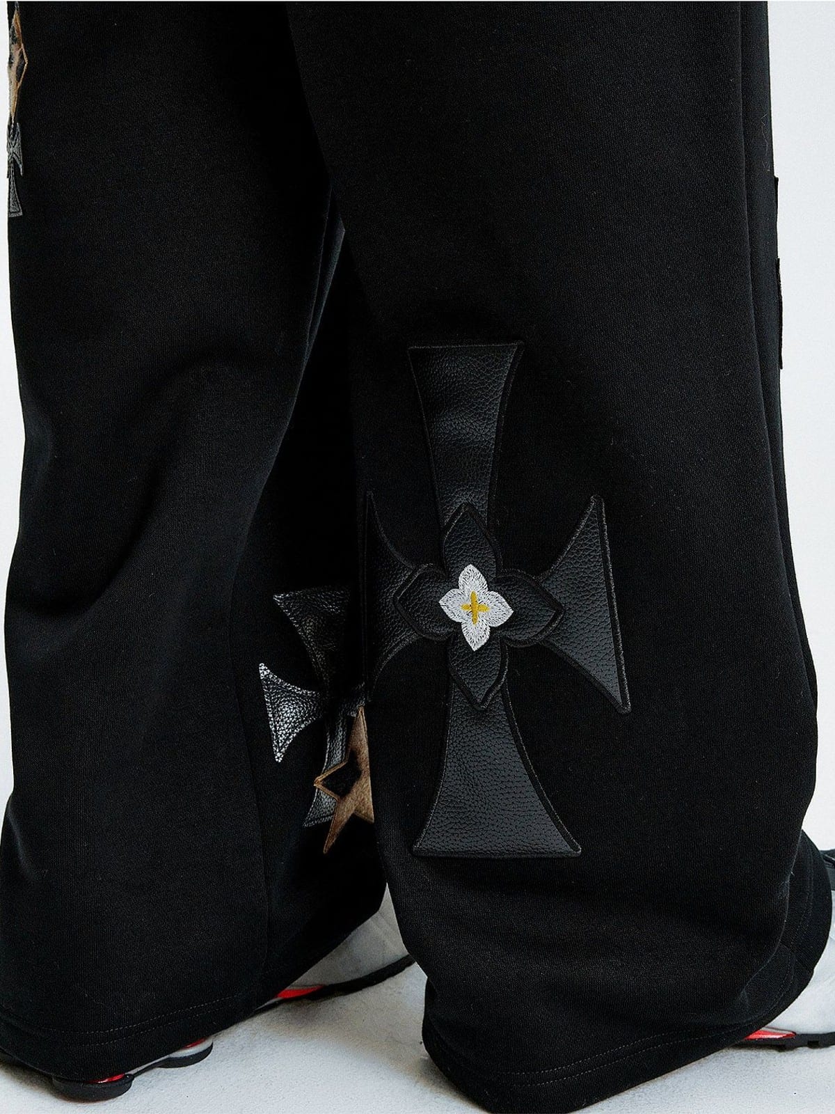 MEDM Leopard Leather Patch Drawstring Pants in Black - On Model