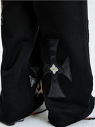 MEDM Leopard Leather Patch Drawstring Pants in Black - On Model