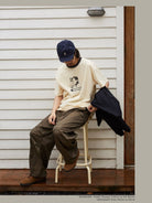 USAGE Graphic Cotton Ringer T Shirt in Cream - On Male Model