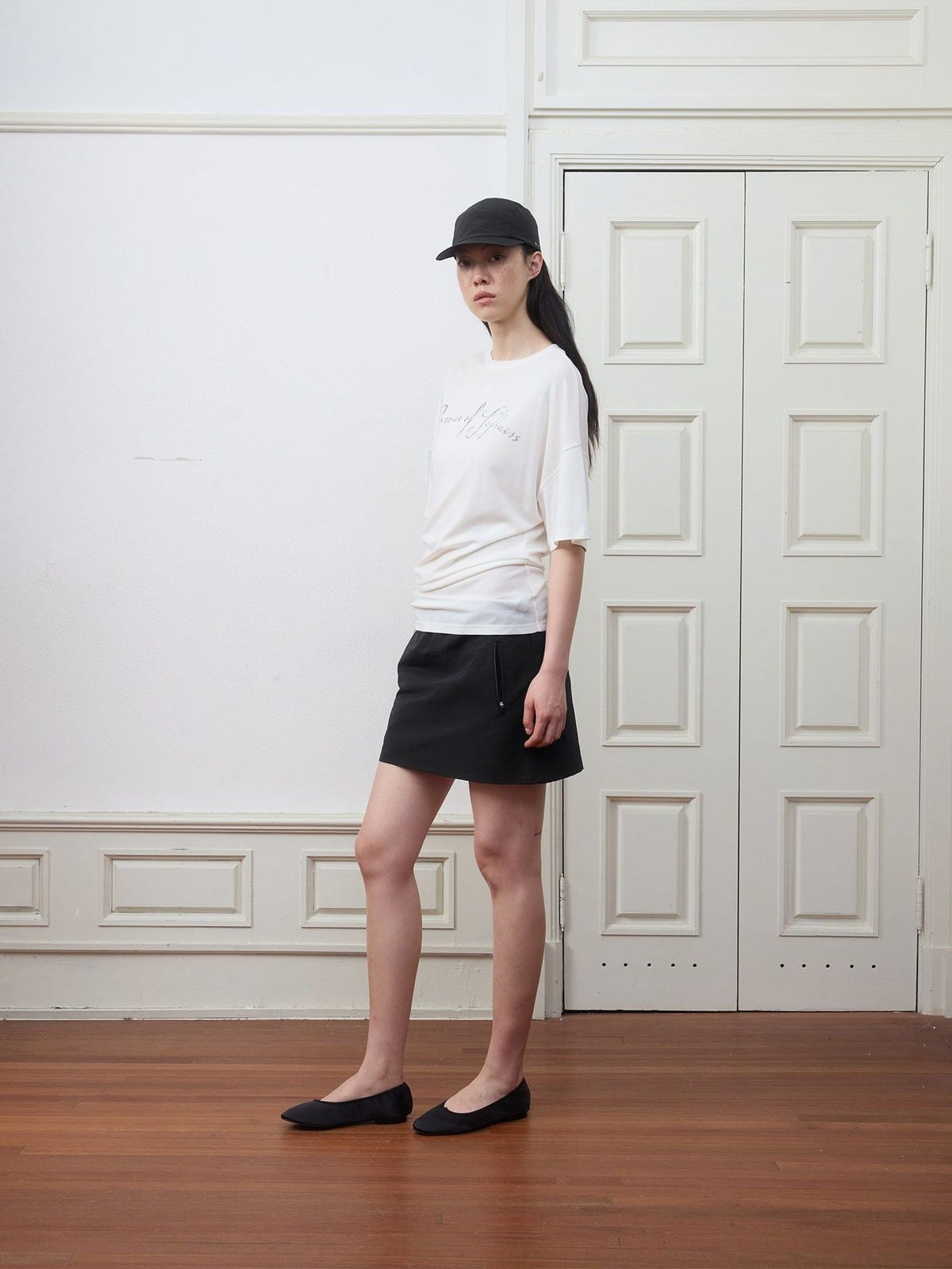 Random Piece Ruched Asymmetrical Graphic T Shirt in White - On Female Model