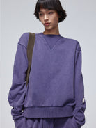 SIMPLE PROJECT Faded Cotton Crewneck Sweatshirt in Purple - On Model
